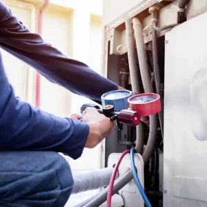 technician with gauge